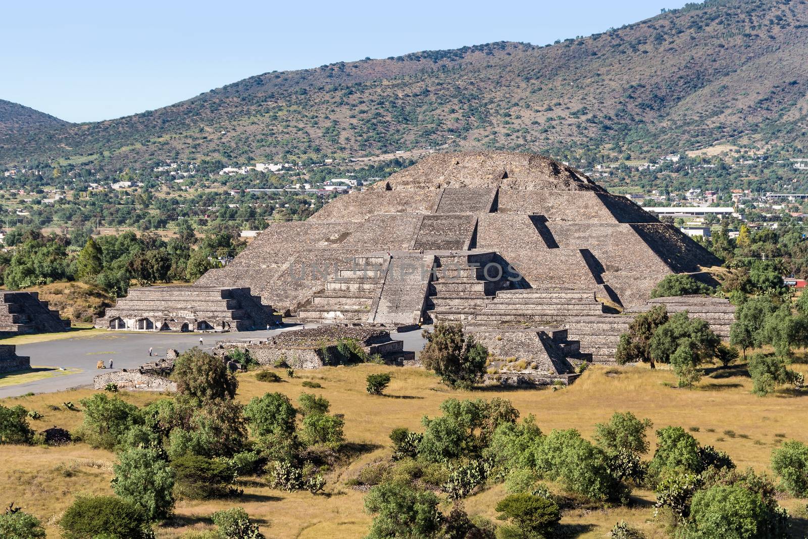 Pyramid of the Moon with Plaza of the Moon and a part of the Avenue of the Dead seen from the Pyramid of the Sun in San Joan Teotihuacan, near Mexico City, Mexico, on a sunny afternood.
