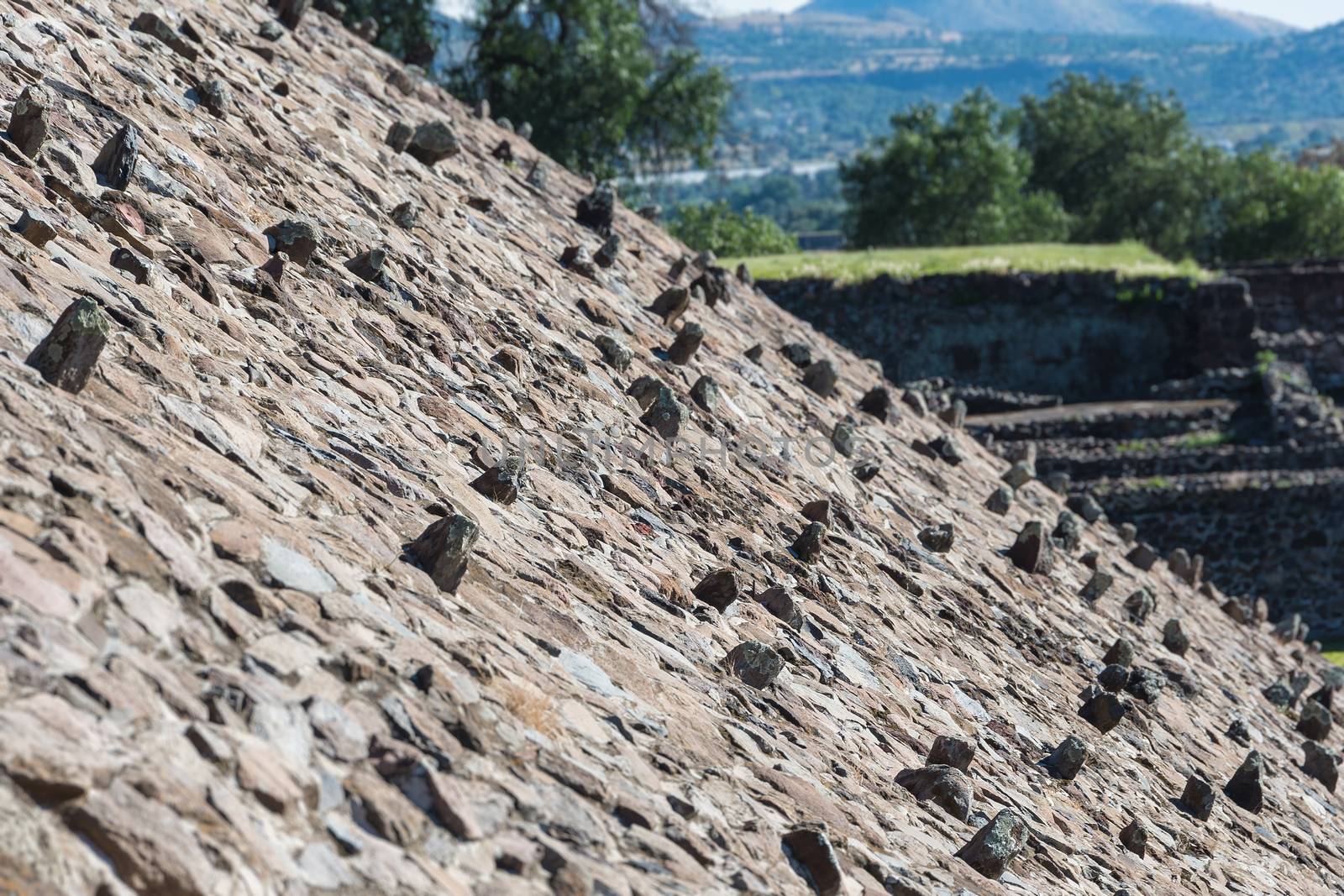 Rocks sticking out on the slope of the Pyramid of the Sun in San Joan Teotihuacan, near Mexico City in Mexico.