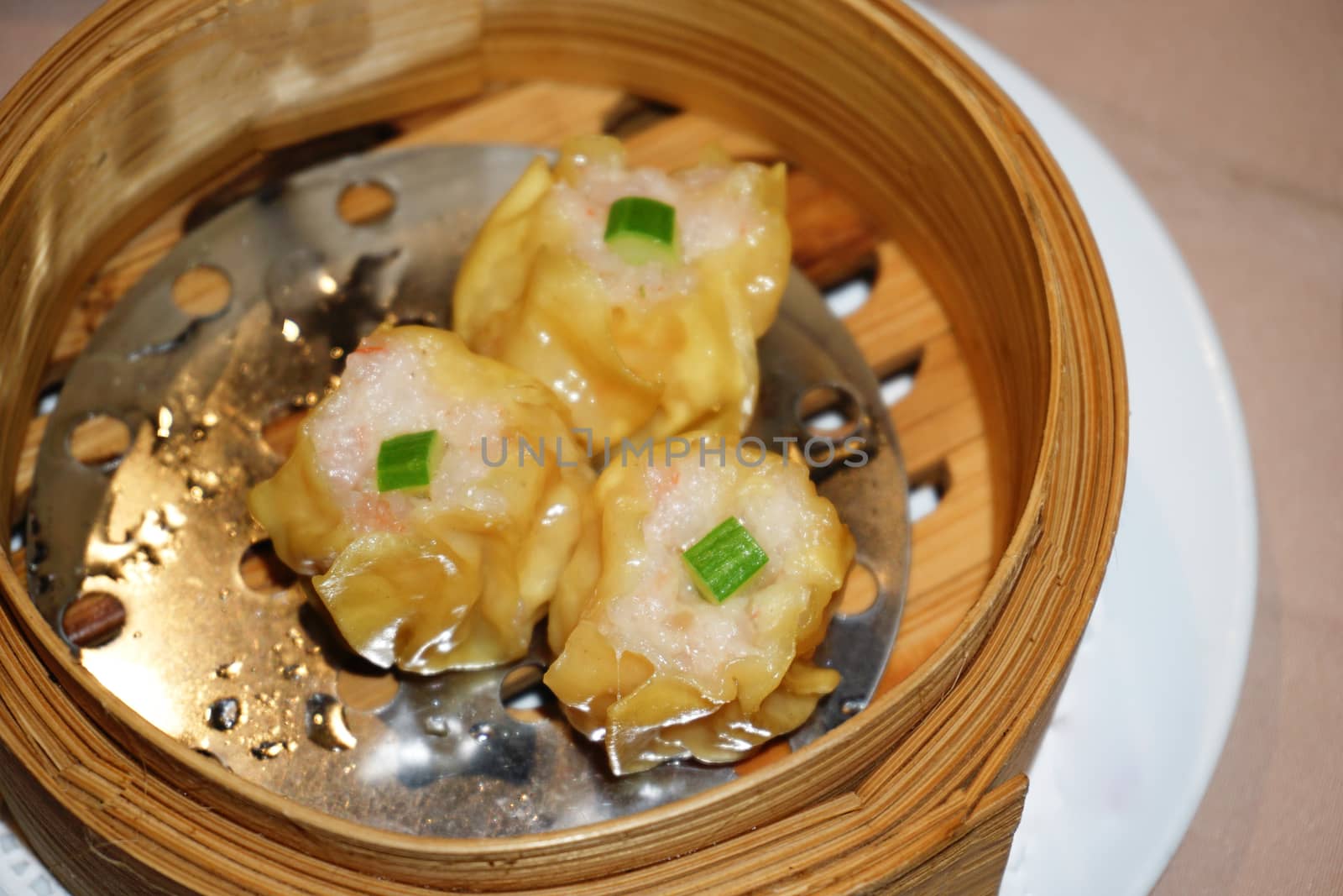 Various Dim Sum in Bamboo Steamed Bowl by nopparats