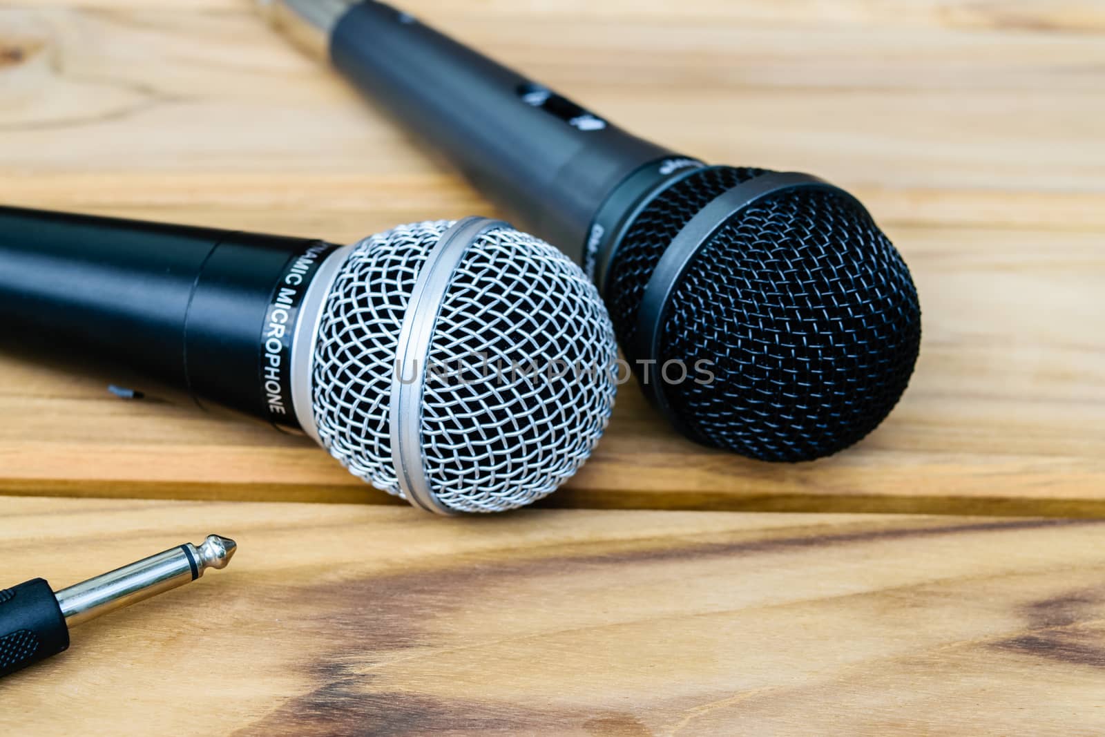 microphone on sack wooden background