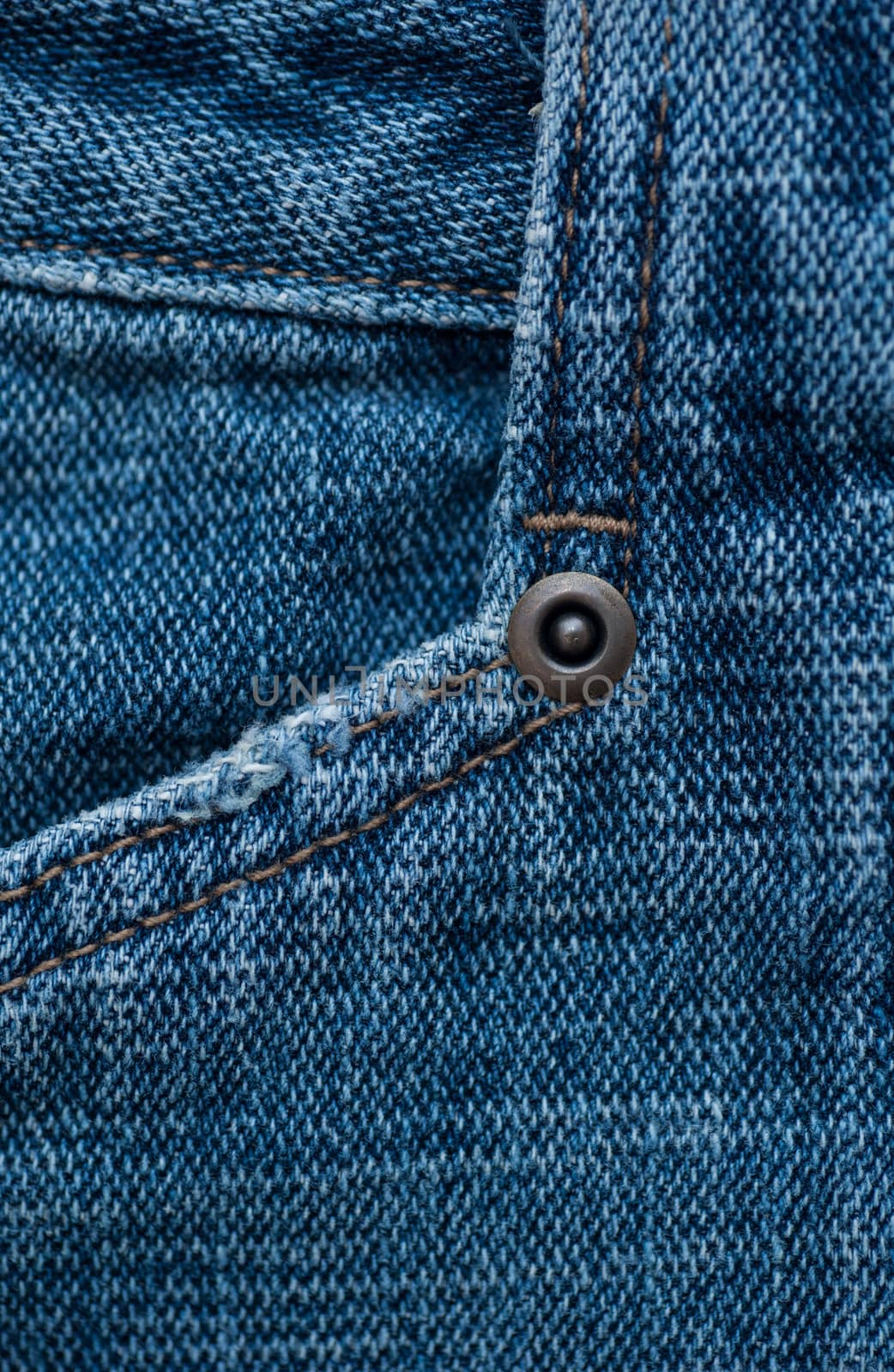 denim texture with rivets for background and place for text.