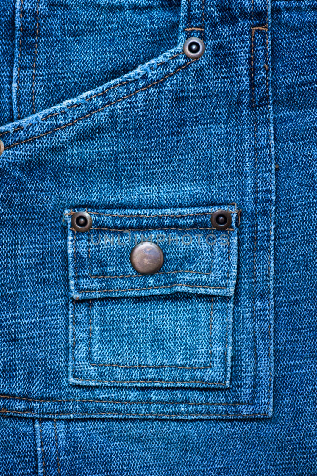 denim texture with rivets for background by timonko
