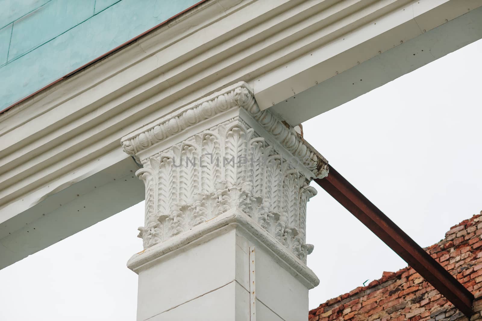 architectural echinus of the column on the facade of a historic building