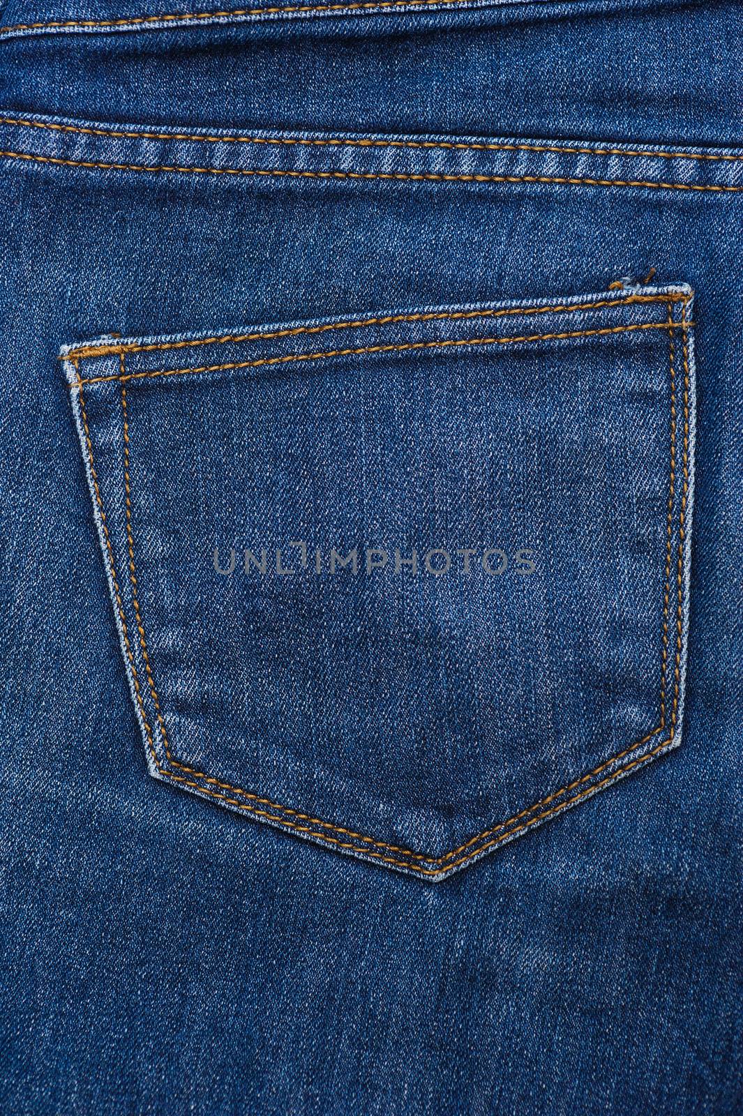 blue texture of jeans, stitching on the pants closeup by timonko
