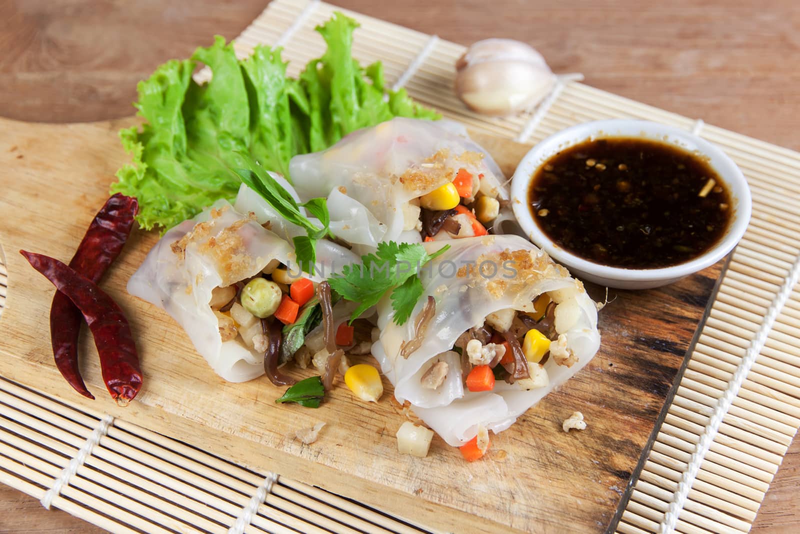 Noodle tube is appetizer menu Asia. made from noodle stuffed with pork and vegetables cooking by steamed.