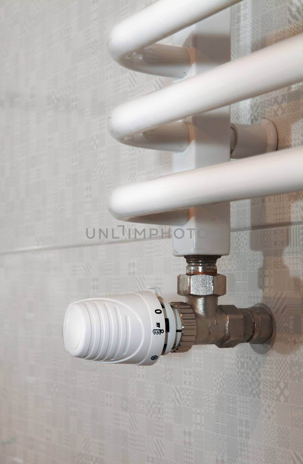 temperature regulator on heated towel rail