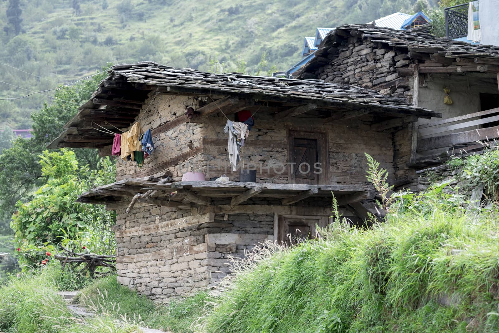 An abandoned traditional style house in the rural Himalayan village Shimla, Himachal Pradesh, India.