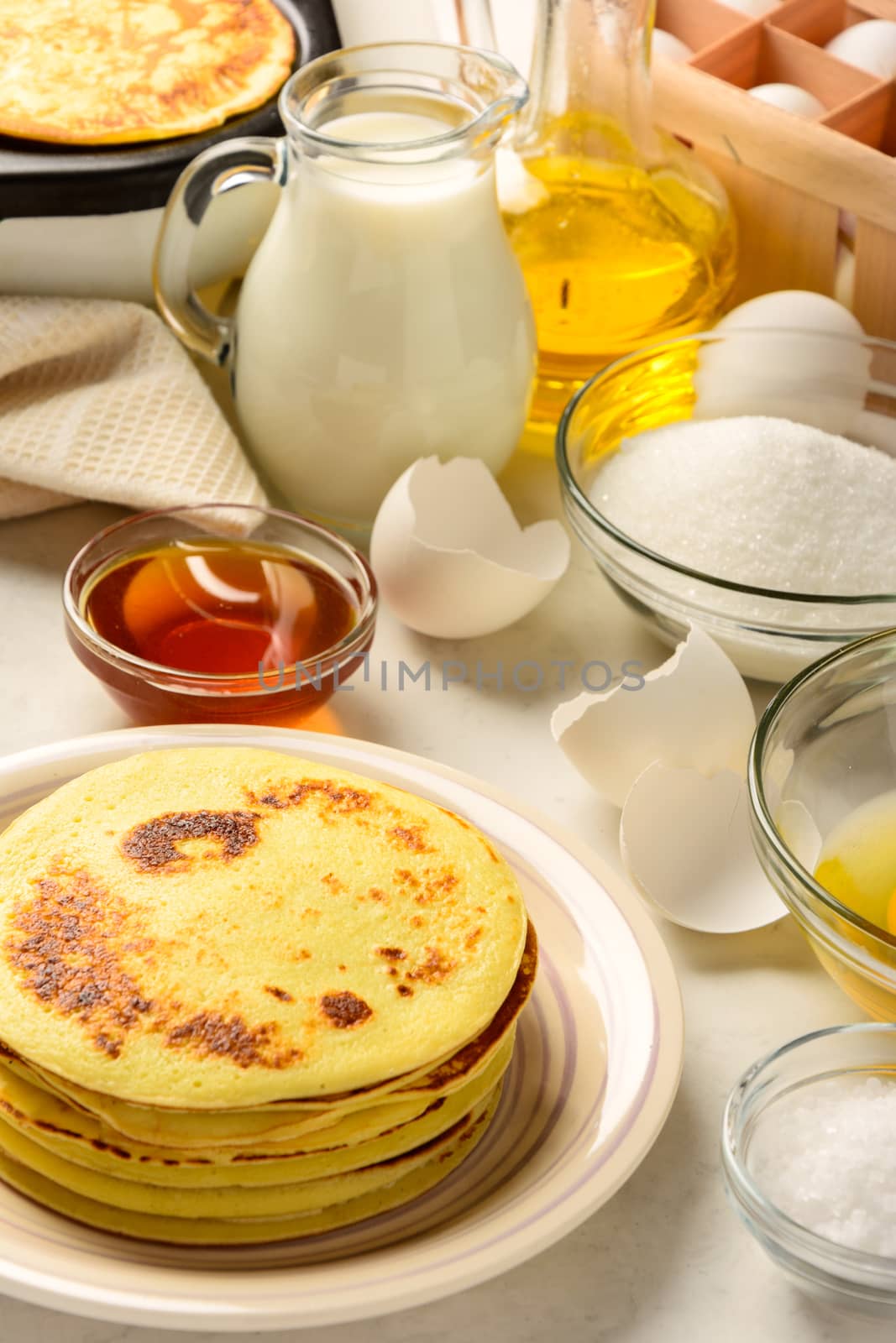 Pancakes and ingredients for making pancakes  by markova64el