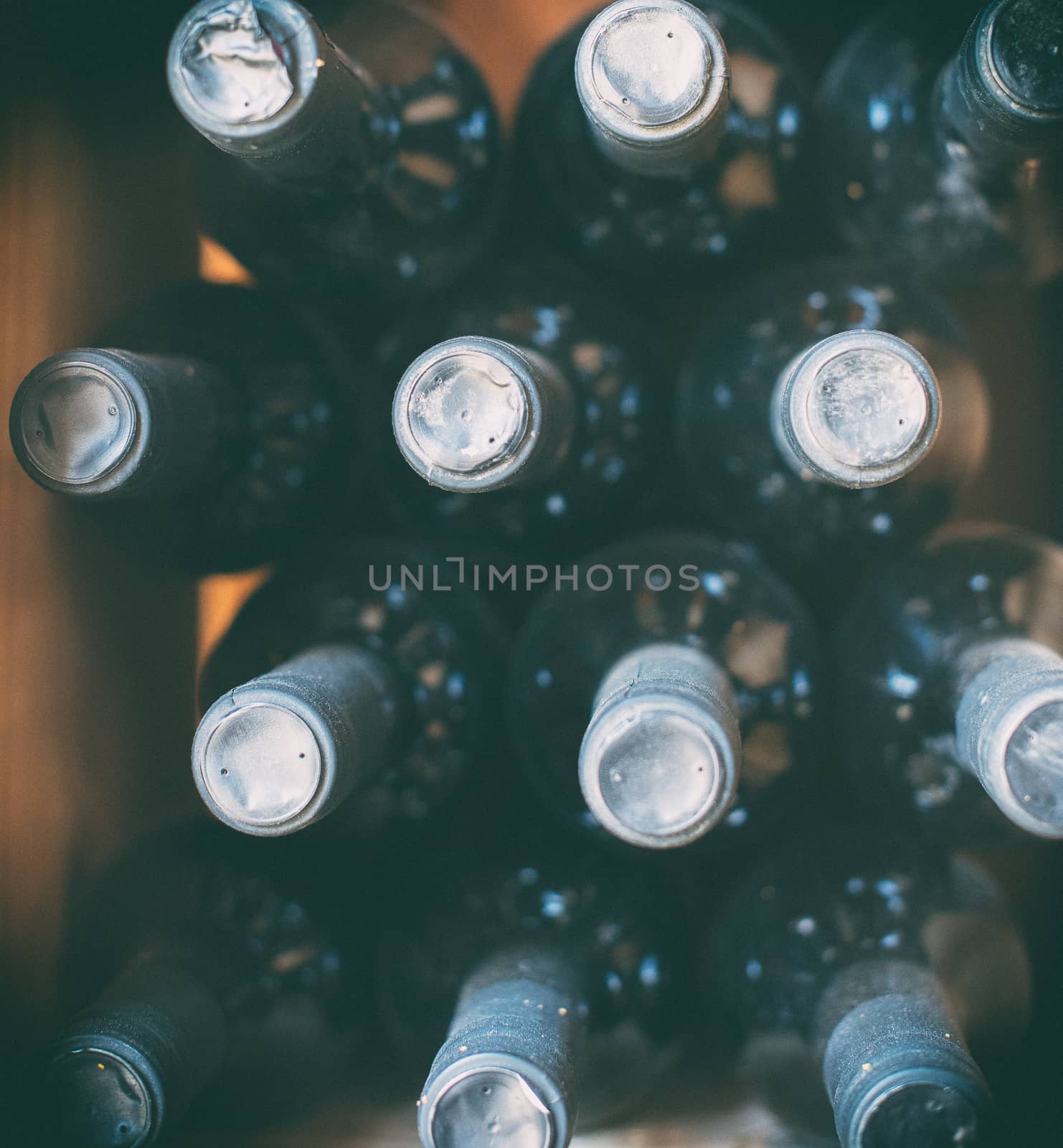 Wine bottles in the wine store. Top view. by dmitrimaruta