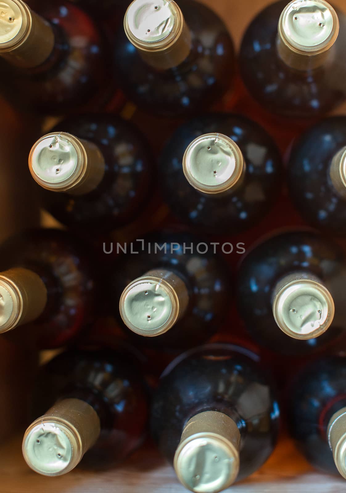 Wine bottles in the wine store. Top view. by dmitrimaruta