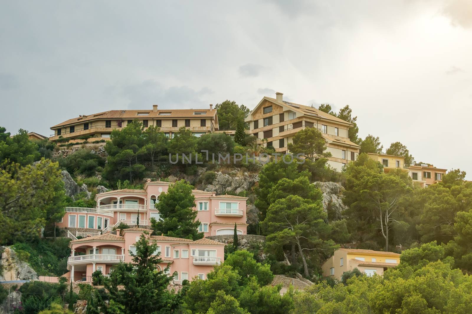 Houses in the green mountain hills. by dmitrimaruta