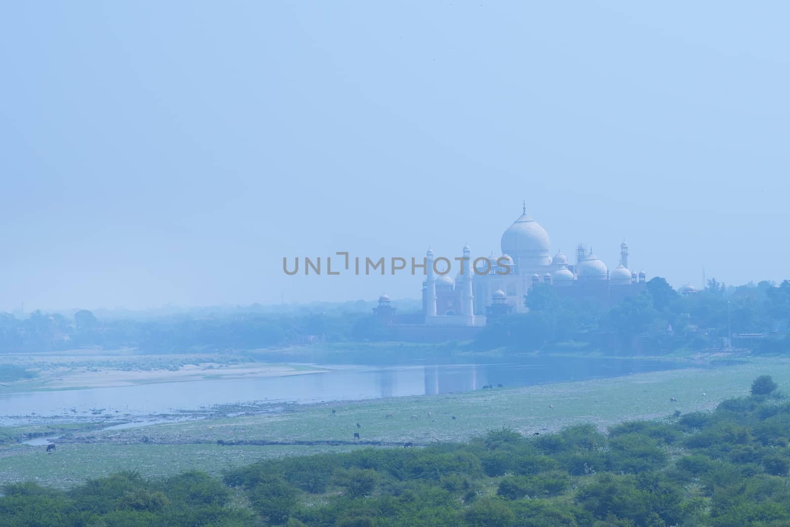 The Taj Mahal and river Yamuna viewed from Red Fort, Agra, India.