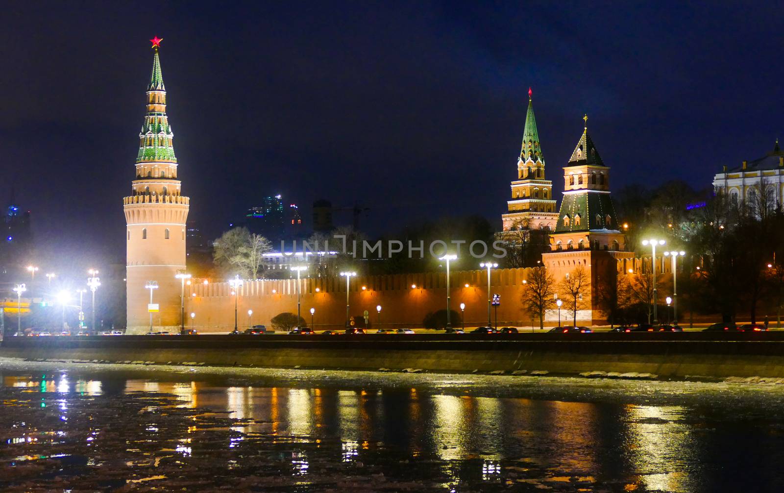 The Kremlin and the Moscow river at night in winter