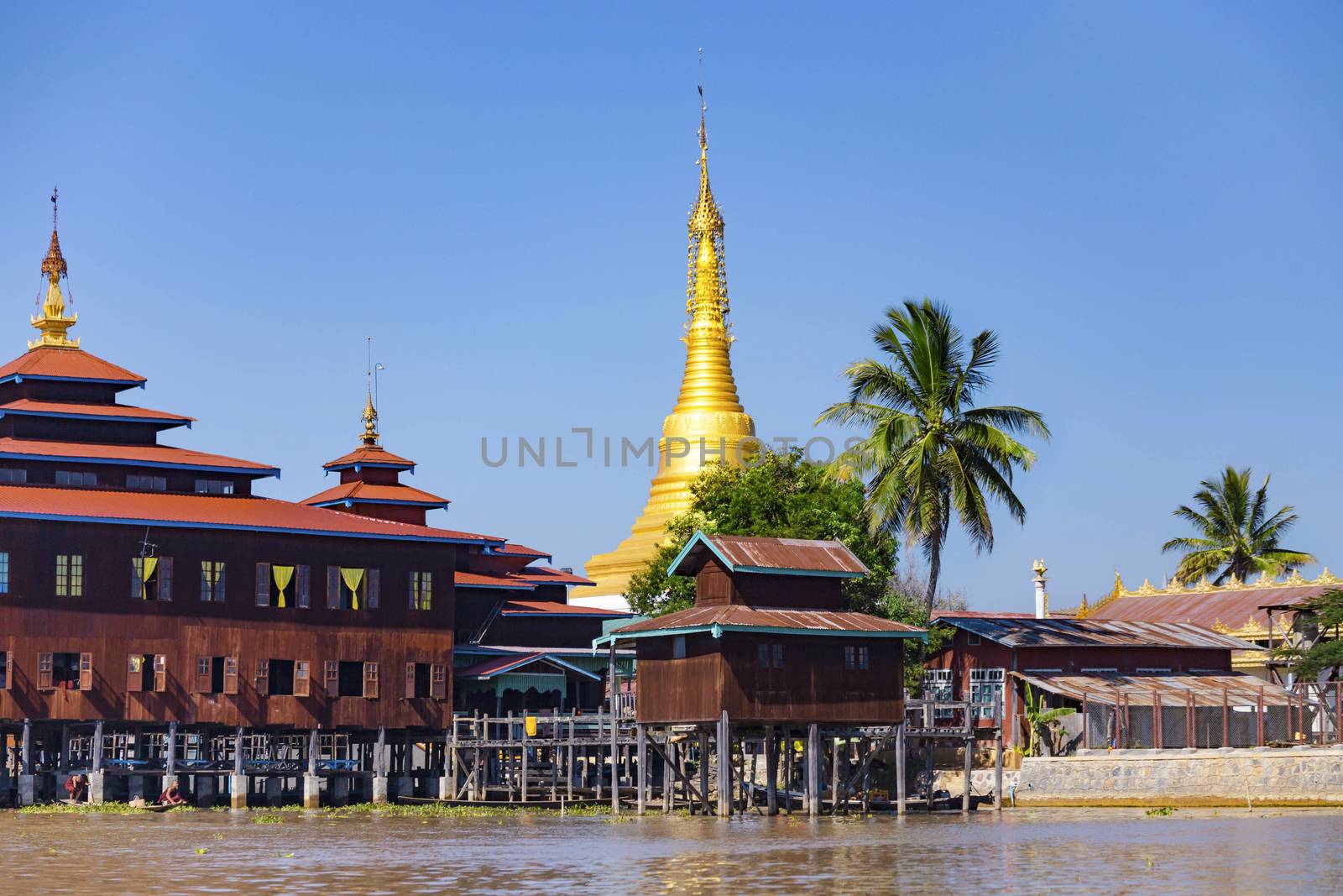 Traditional wooden stilt houses at the Inle lake by cozyta