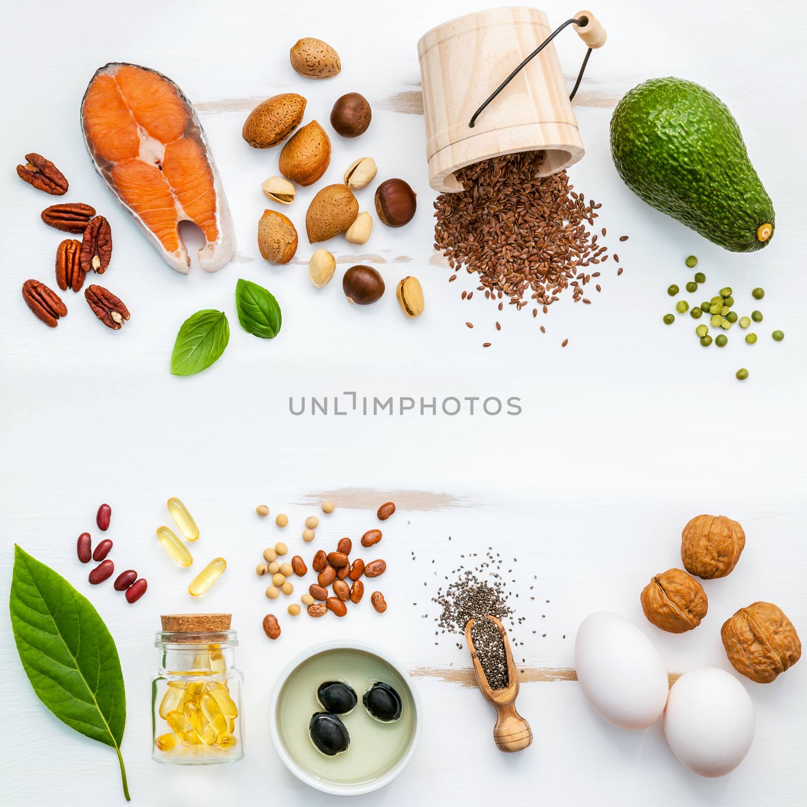 Selection food sources of omega 3 . Super food high omega 3 and unsaturated fats for healthy food. Almond ,pecan ,hazelnuts,walnuts ,olive oils ,fish oils ,salmon ,flax seeds ,chia ,eggs and avocado .