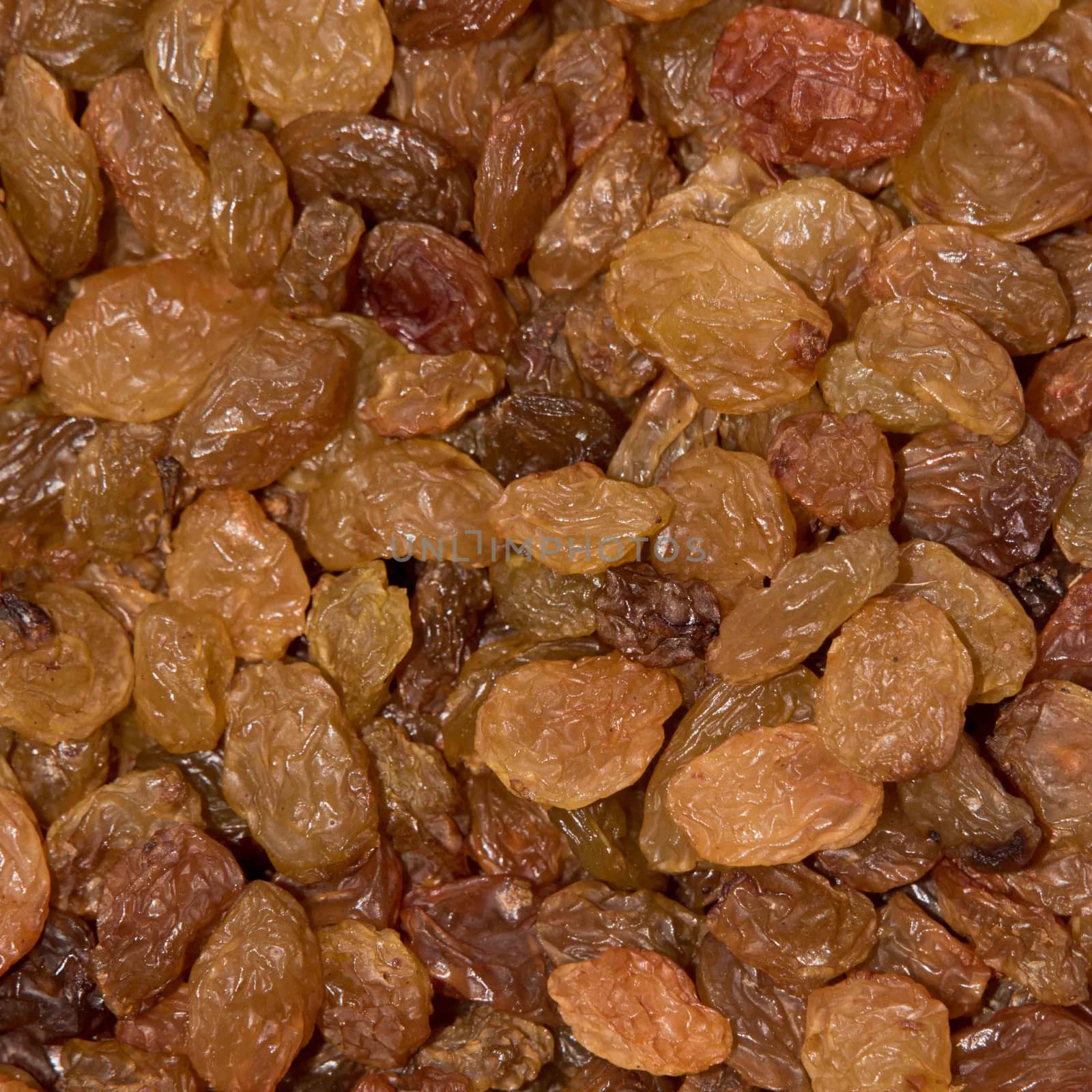 Raisin texture. golden raisin background, dry sultana seeds, vegetarian organic food