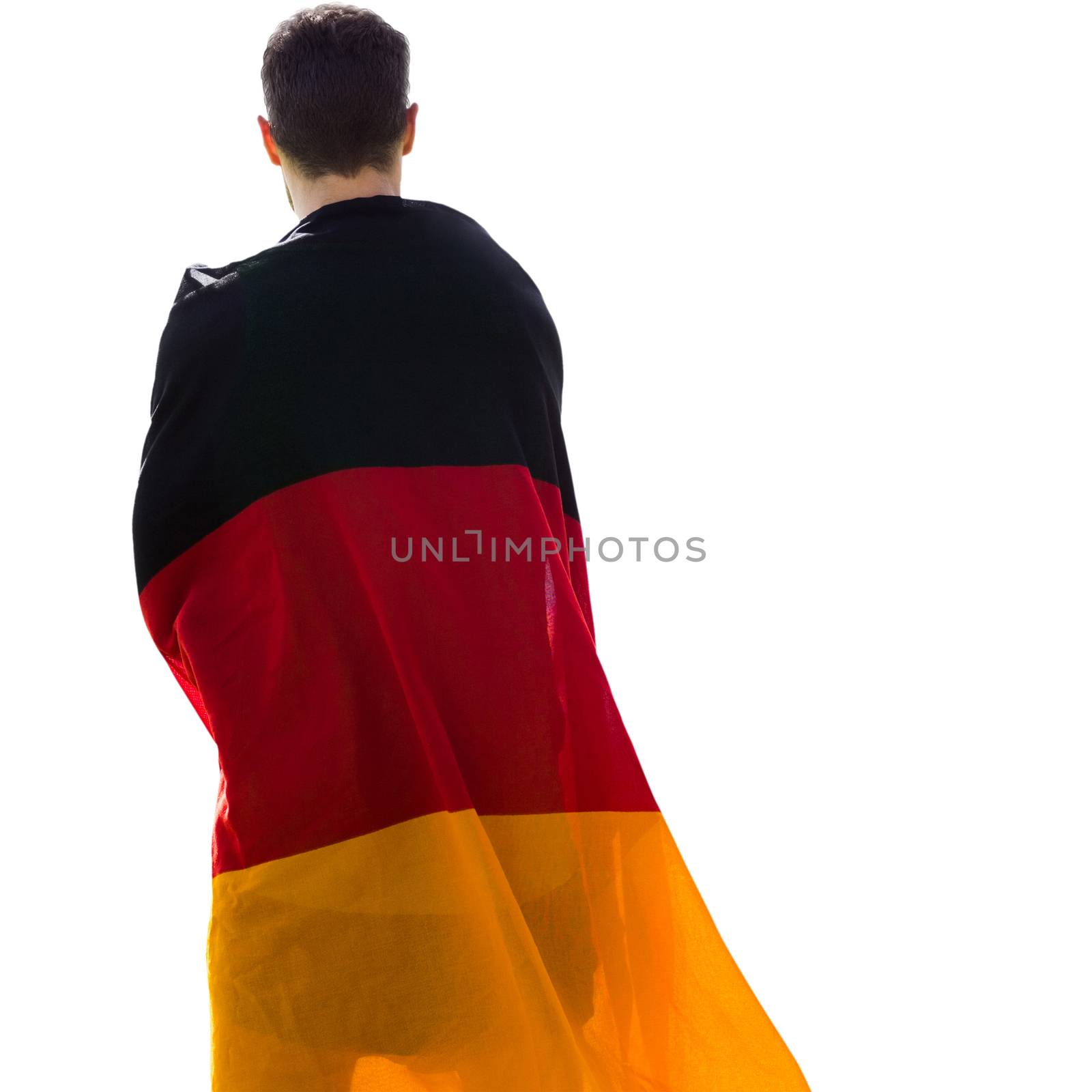 Rear view of man wearing german flag in a white background 