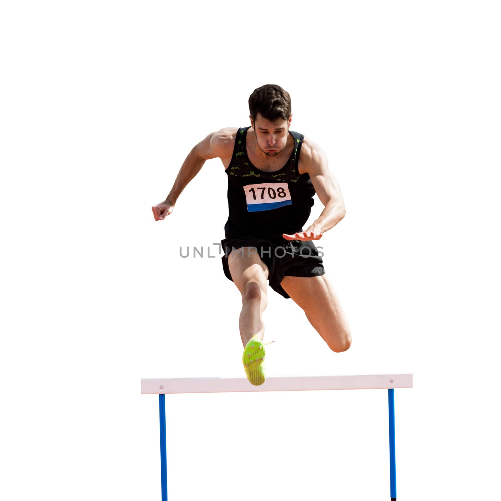Sportsman practicing hurdles in a white background