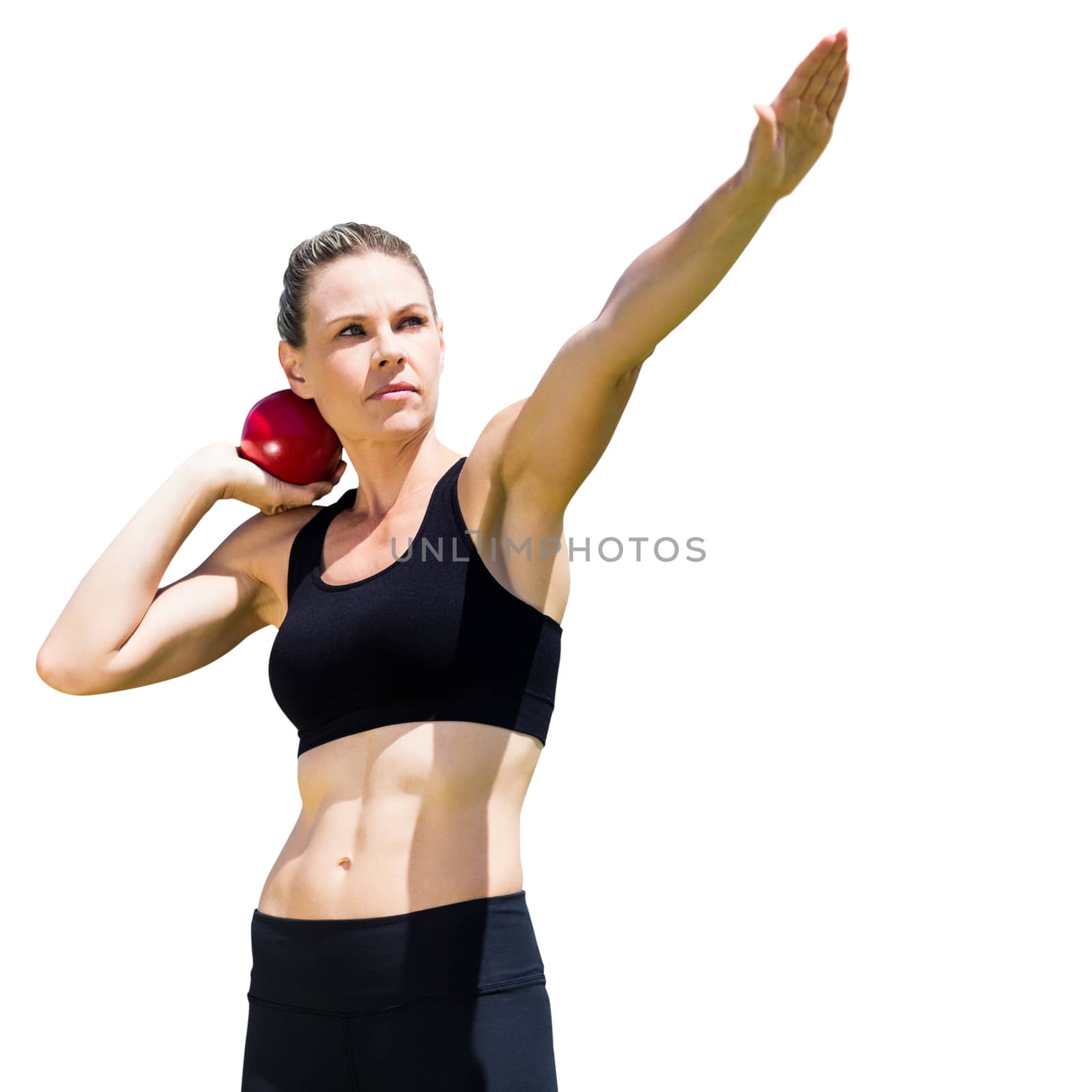 Sportswoman practicing the shot put in a white background 
