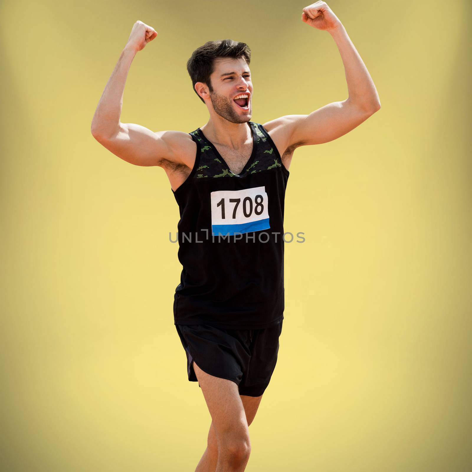 Sportsman celebrating his victory against yellow background