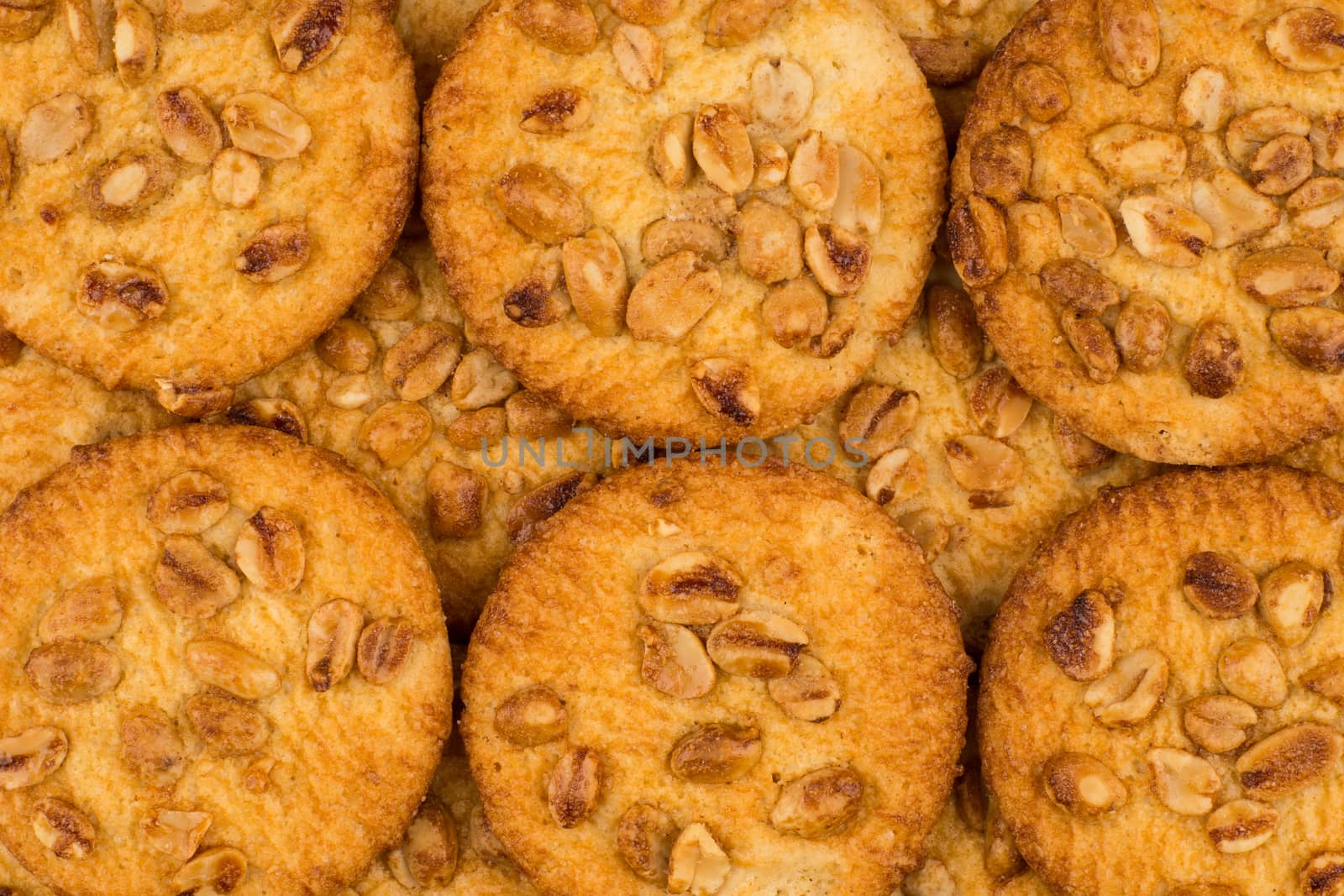Cookies with peanuts. Background texture close-up.