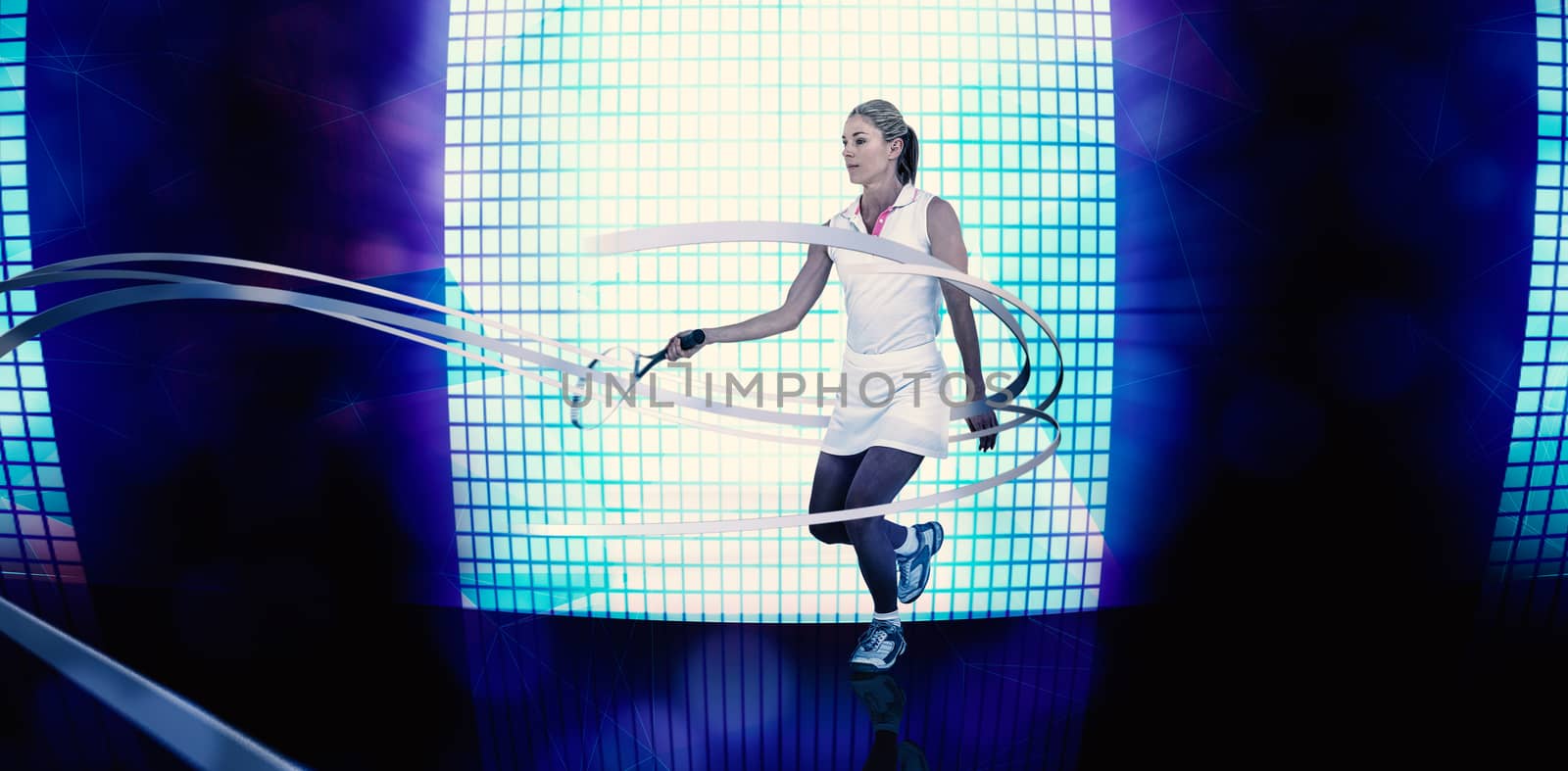 Athlete playing tennis with a racket  against background of blue squares