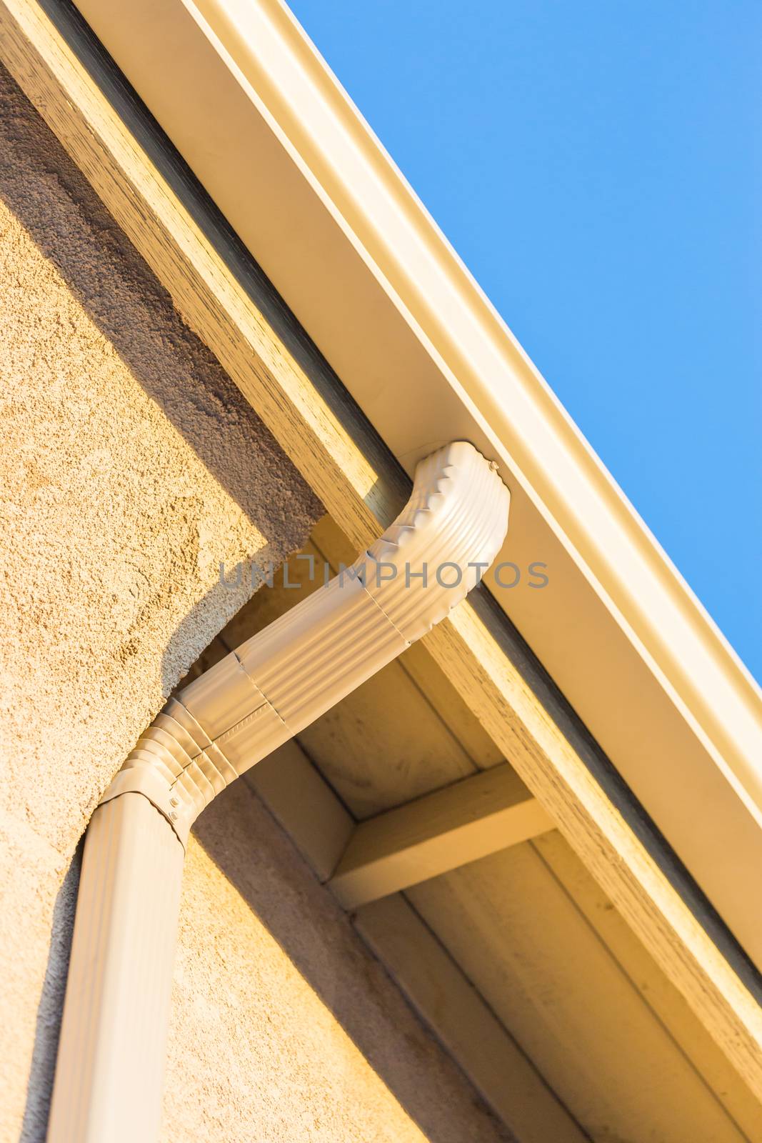 House with New Seamless Aluminum Rain Gutters.