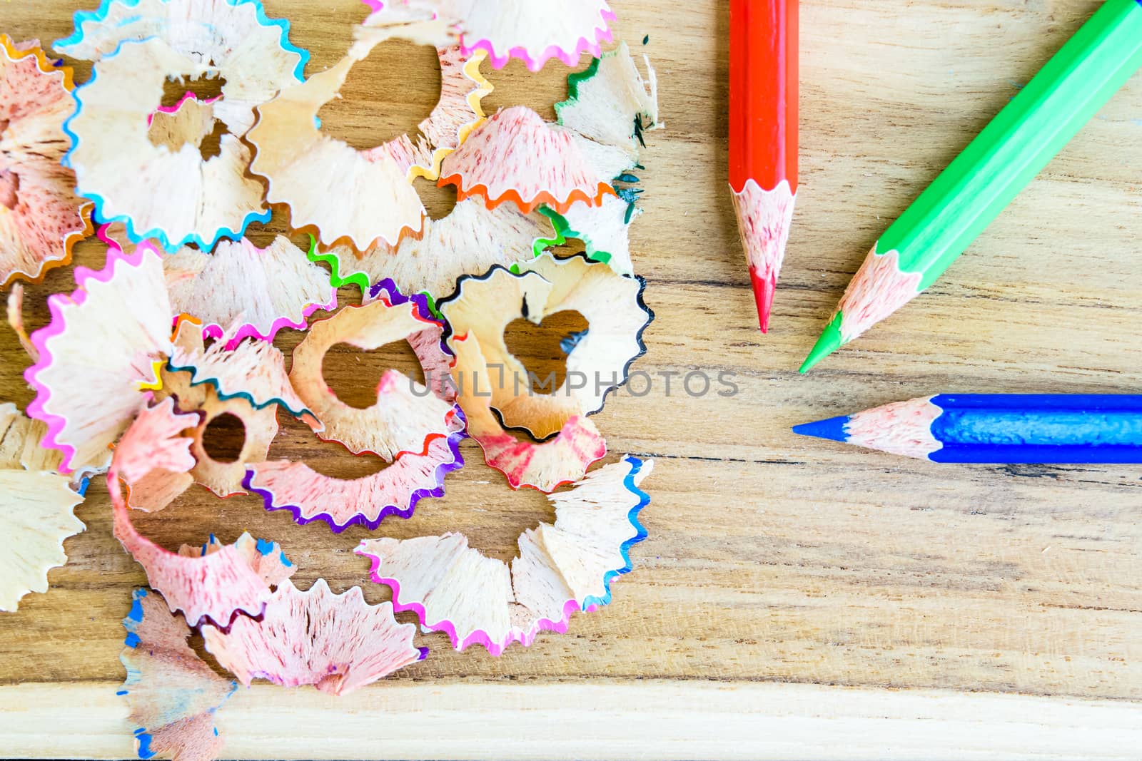 colorful pencils on the wooden table