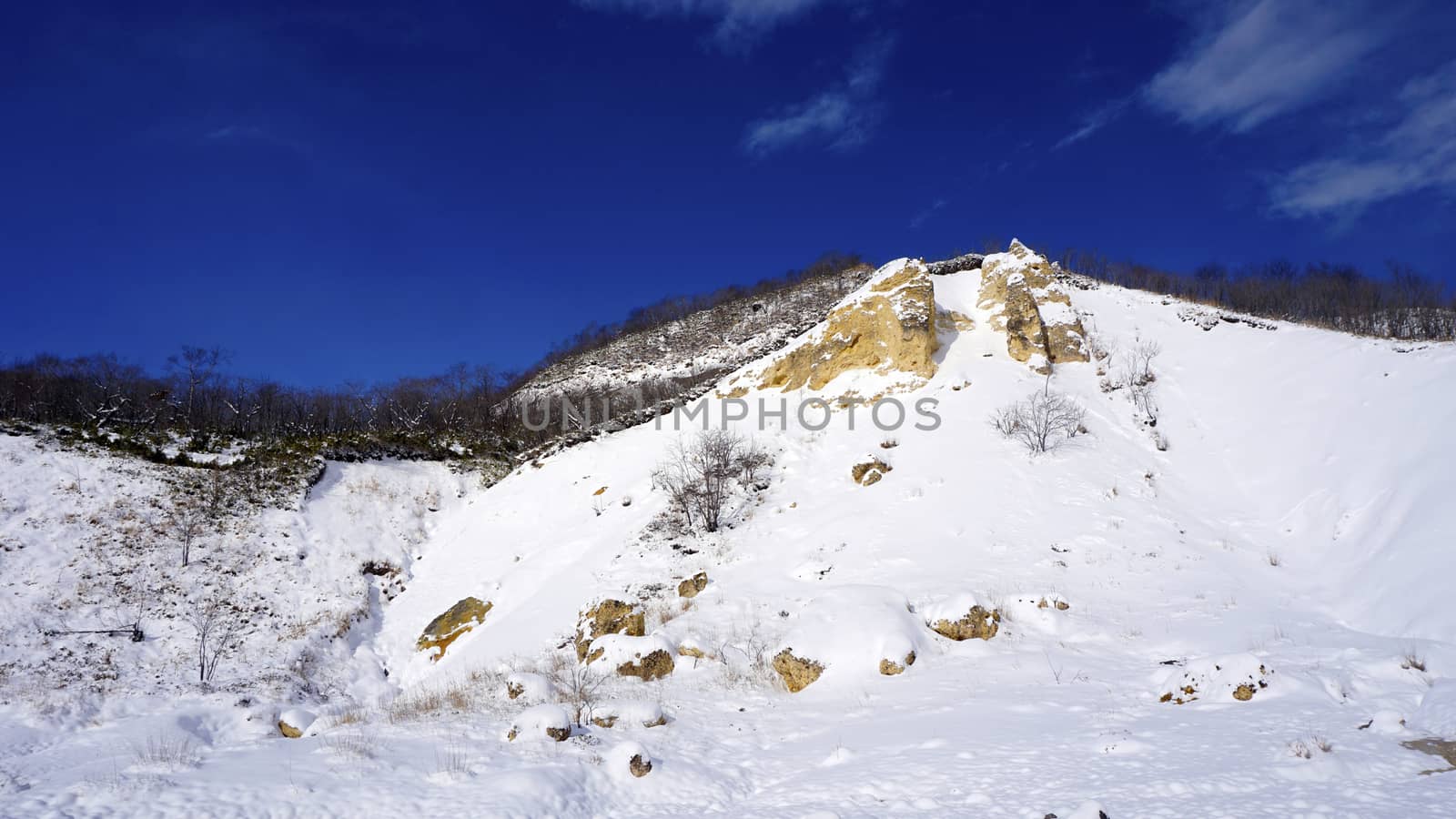 Noboribetsu onsen snow mountain bluesky hell valley winter  by polarbearstudio