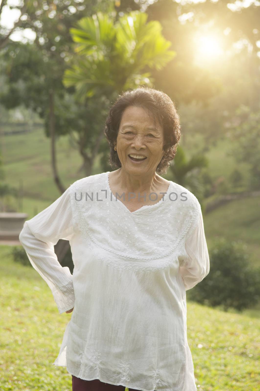Asian seniors woman exercise at outdoor by szefei