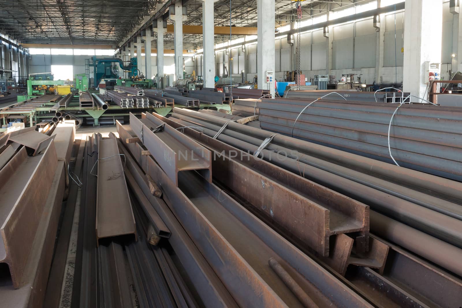 the numerous iron bars inside a factory