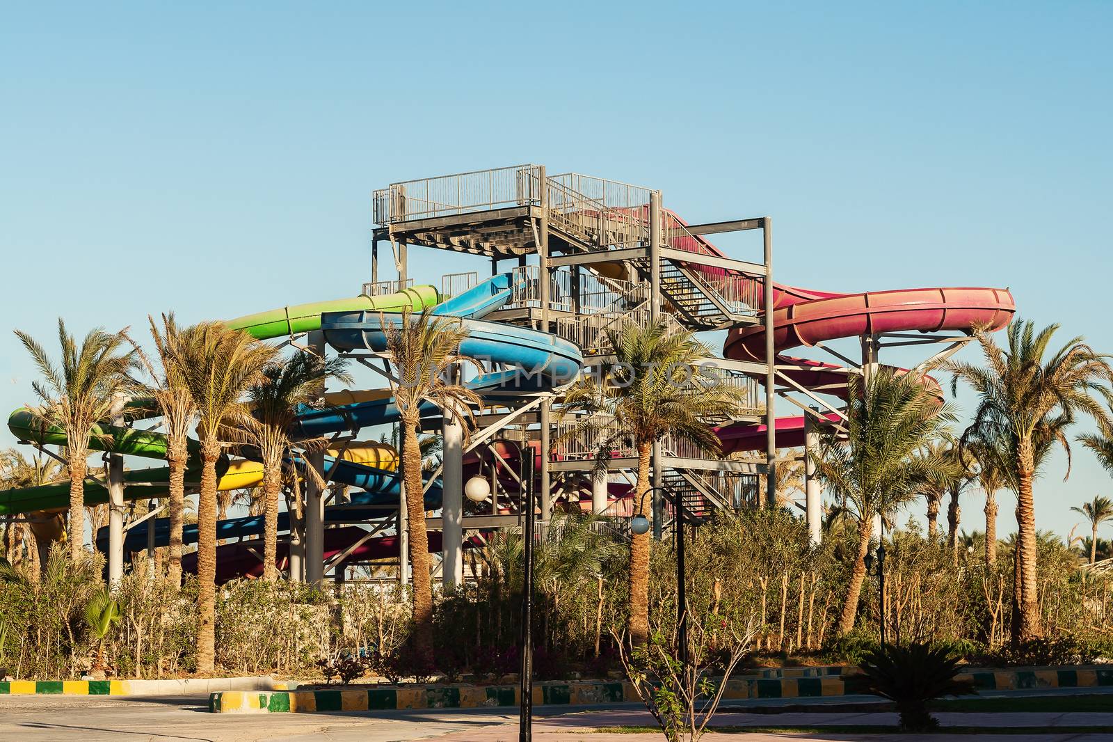 large water park on a background of palm trees.