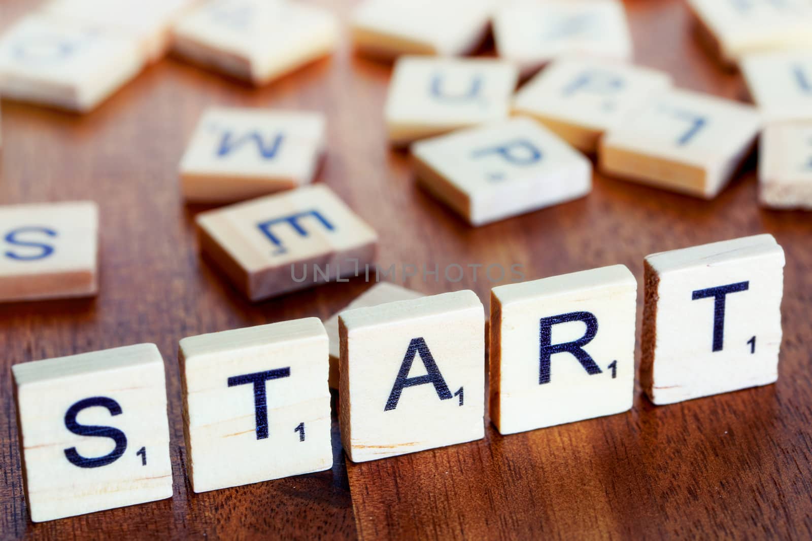 start business letters placed on a desk in precious wood by pixinoo