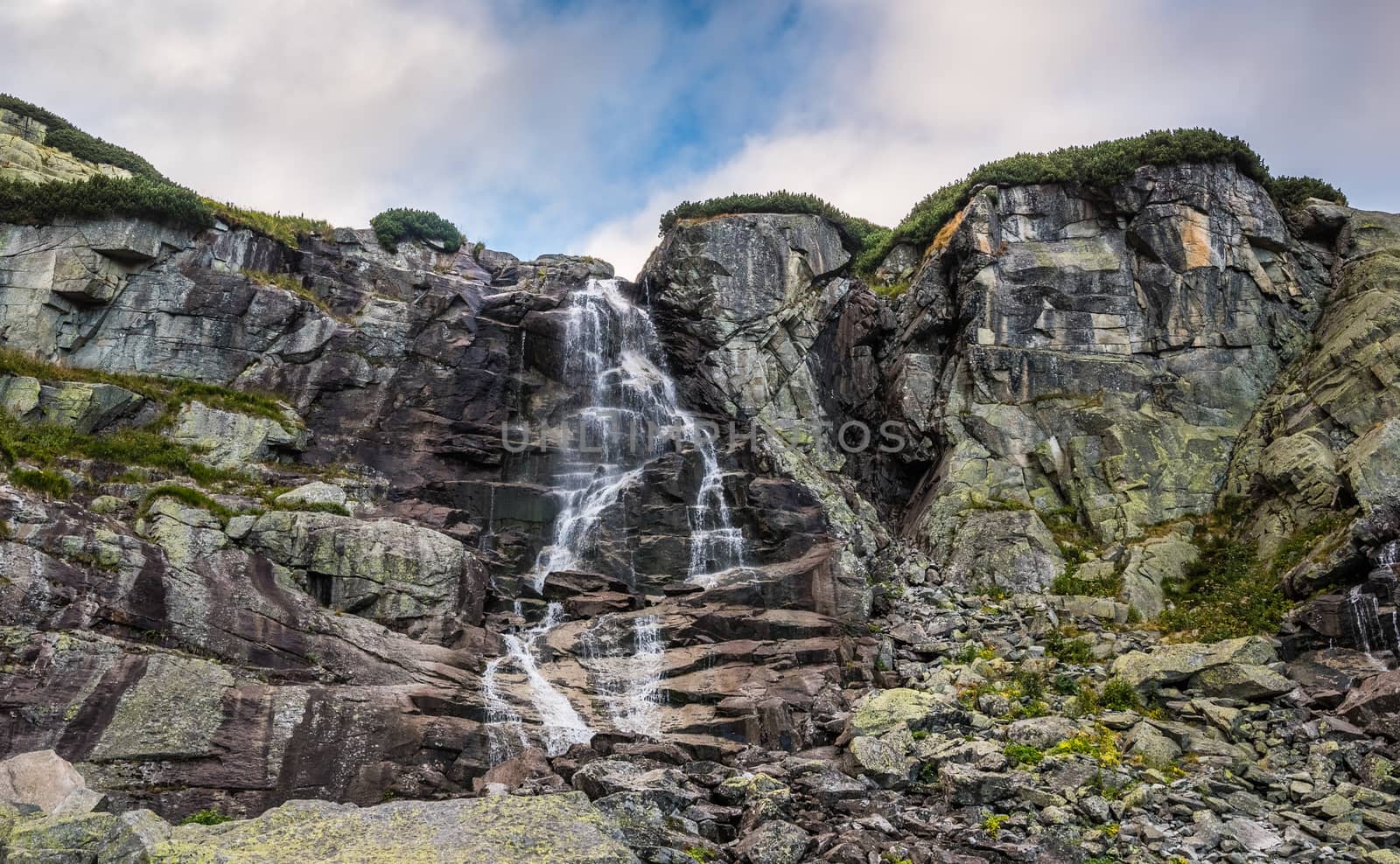 Skok Waterfall in Mountains on Cloudy Day. Mlynicka Valley, High Tatra, Slovakia.