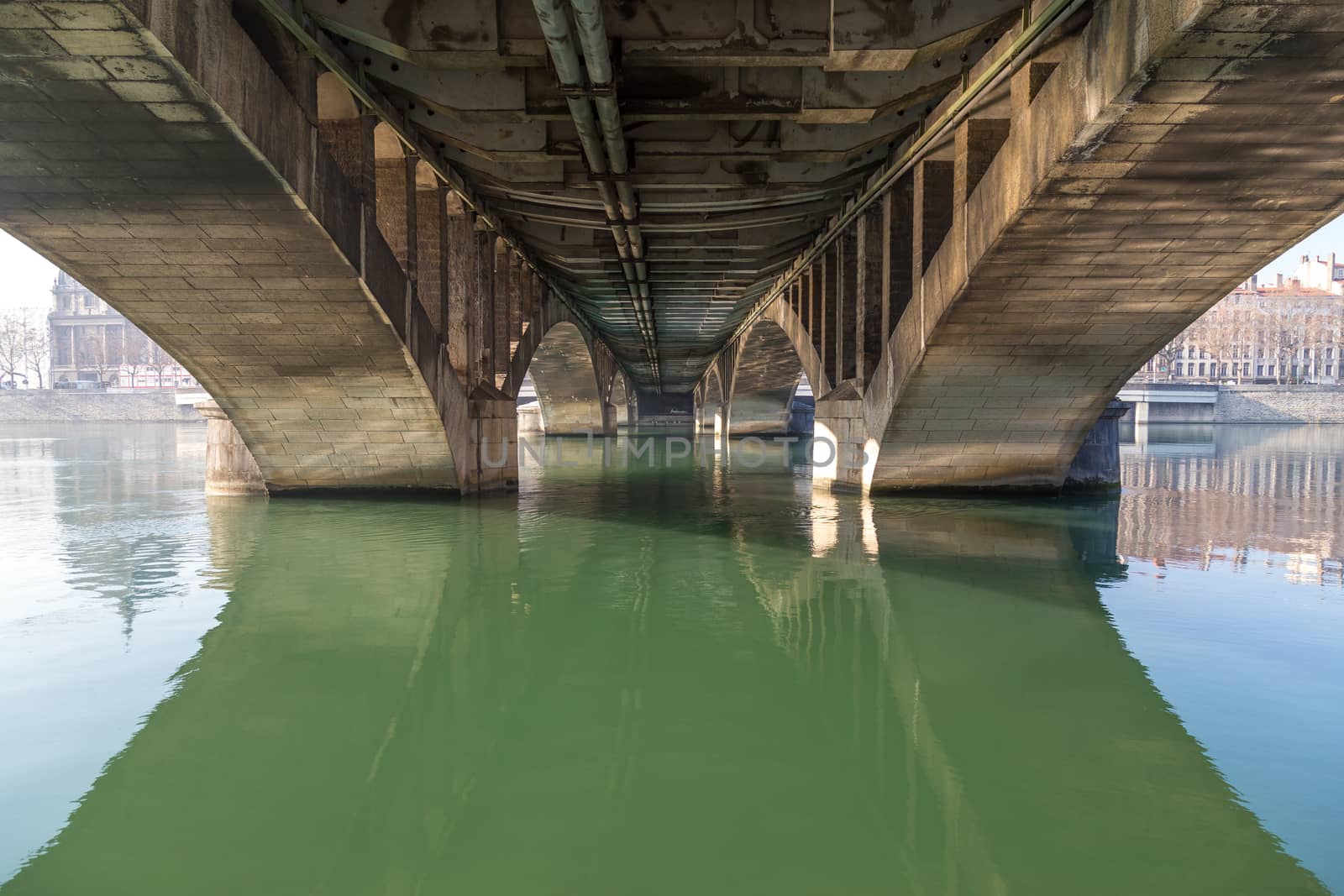 View under a bridge over a river