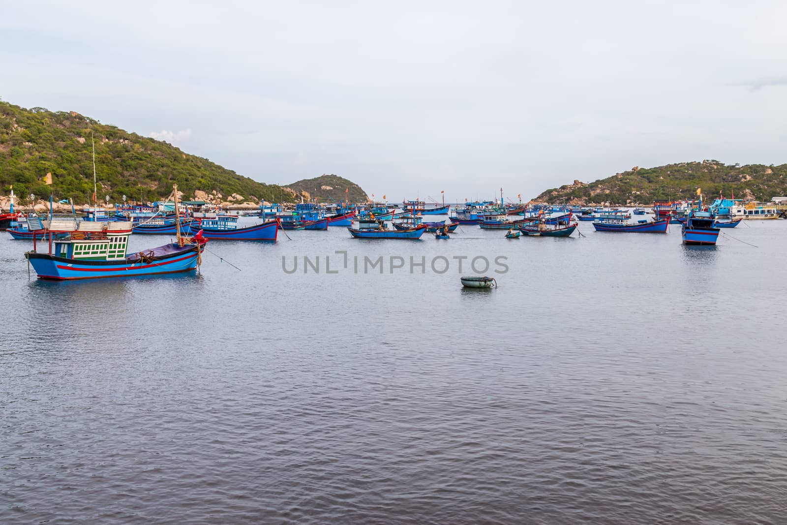 Fishing boats harboured in a bay by kenzo85