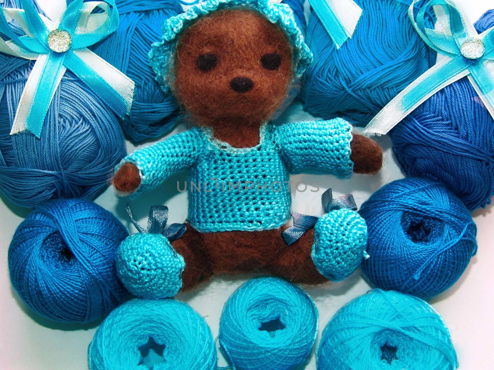 teddy bear handmade. blue yarn