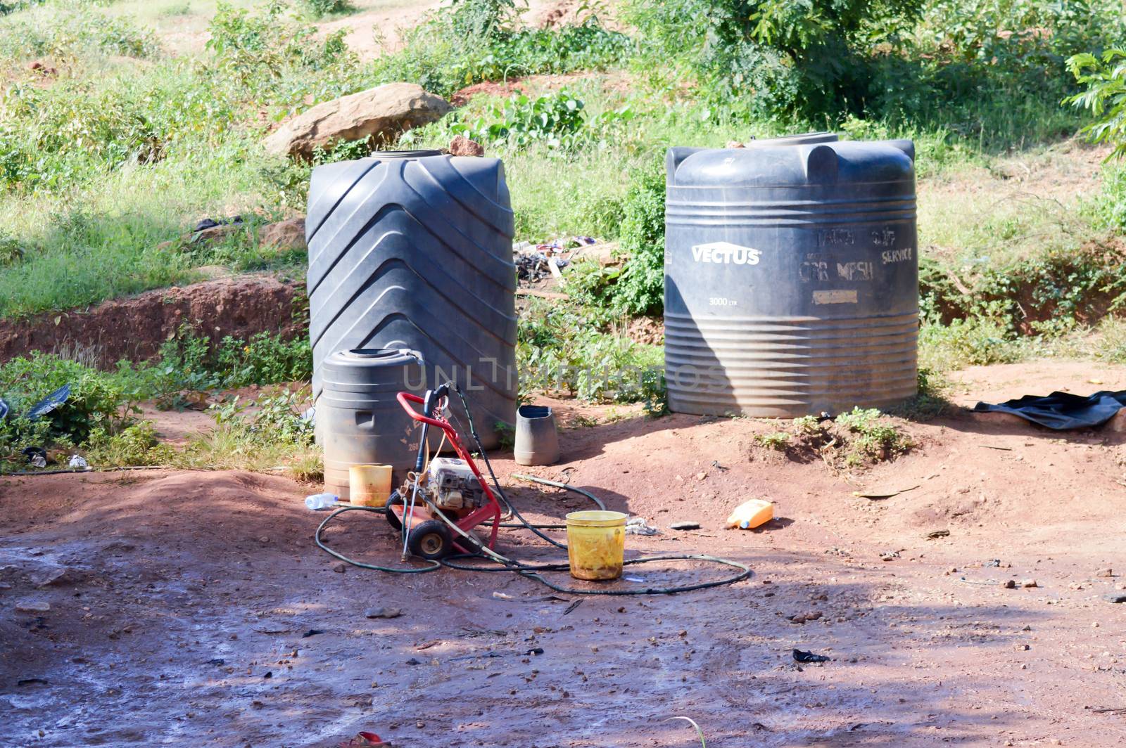 Manual truck washing station on the road from Mombasa to Nairobi in Kenya