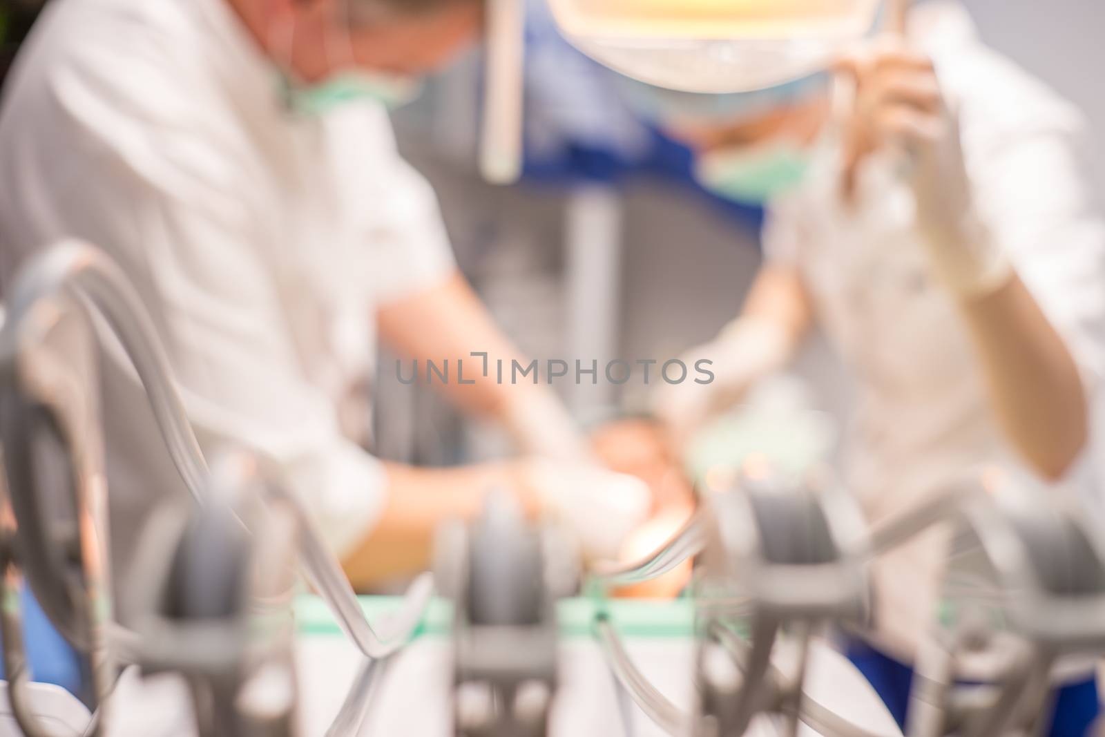 Blur abstract background work with doctor dentist. Blurry view hospital clinical room space with equipment instrument