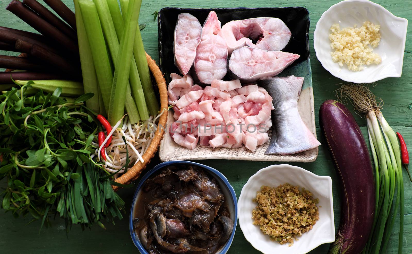 Vietnamese food, mam kho, a featured meal of Mekong Delta, Vietnam. Raw material to cook are basa fish, shrimp, bacon, citronella, garlic, chilli , eat this dish with cooked rice and vegetable