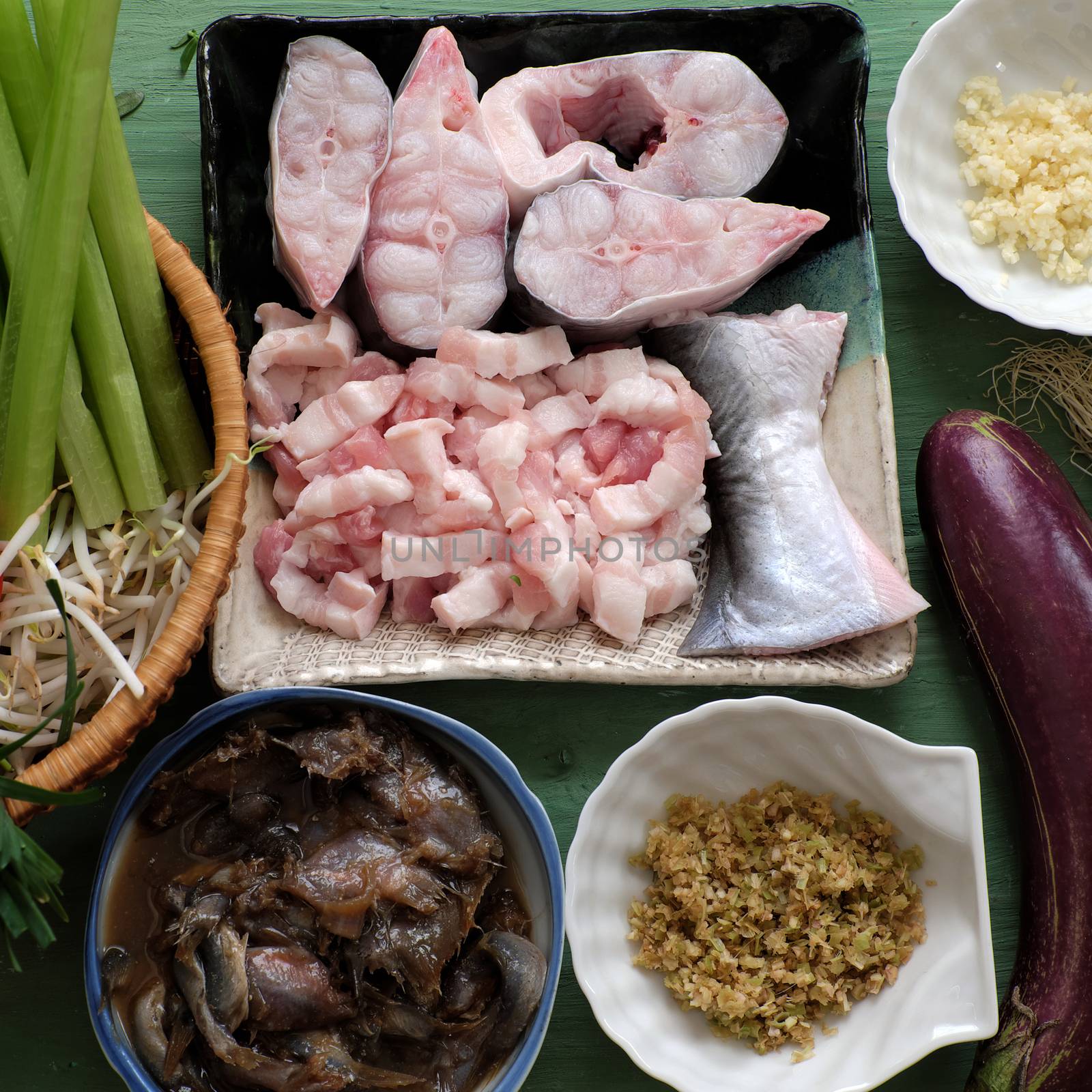 Vietnamese food, mam kho, a featured meal of Mekong Delta, Vietnam. Raw material to cook are basa fish, shrimp, bacon, citronella, garlic, chilli , eat this dish with cooked rice and vegetable