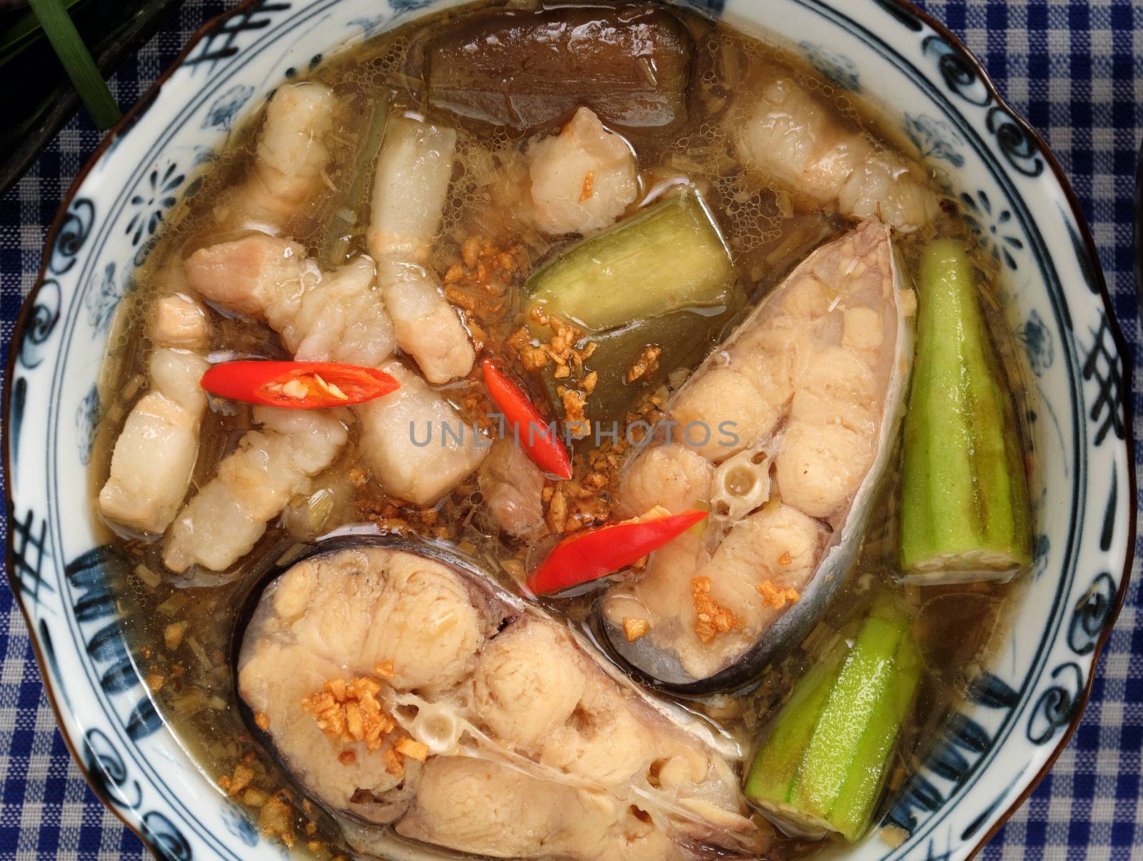 Vietnamese food, mam kho, a featured meal of Mekong Delta, Vietnam. Raw material to cook are basa fish, shrimp, bacon, citronella, garlic, chilli , eat this dish with cooked rice and vegetable