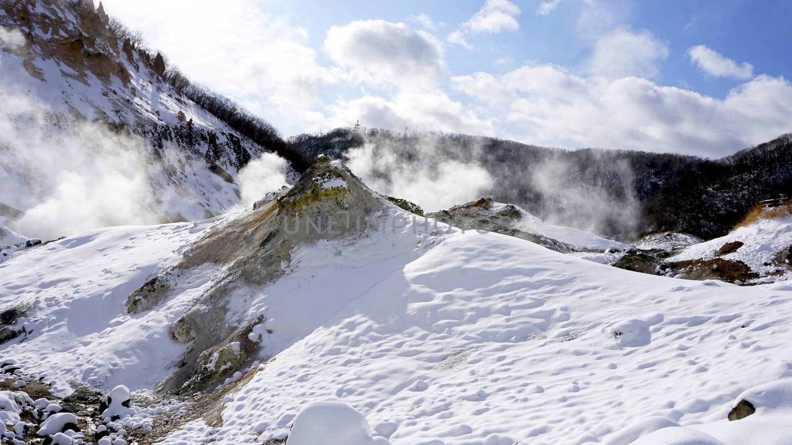 Noboribetsu onsen snow mountain and the mist winter national park in Jigokudani, Hokkaido, Japan