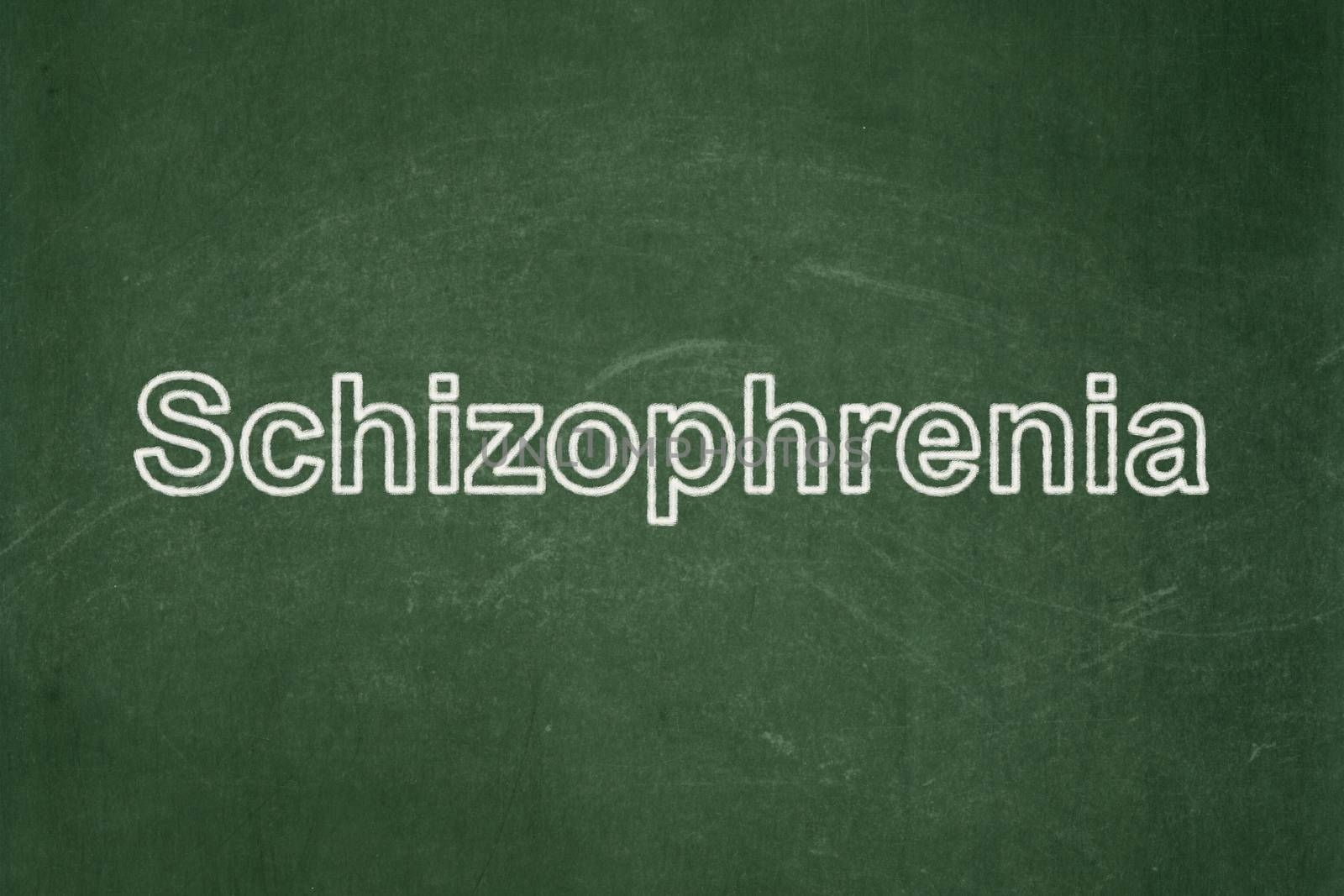 Medicine concept: Schizophrenia on chalkboard background by maxkabakov