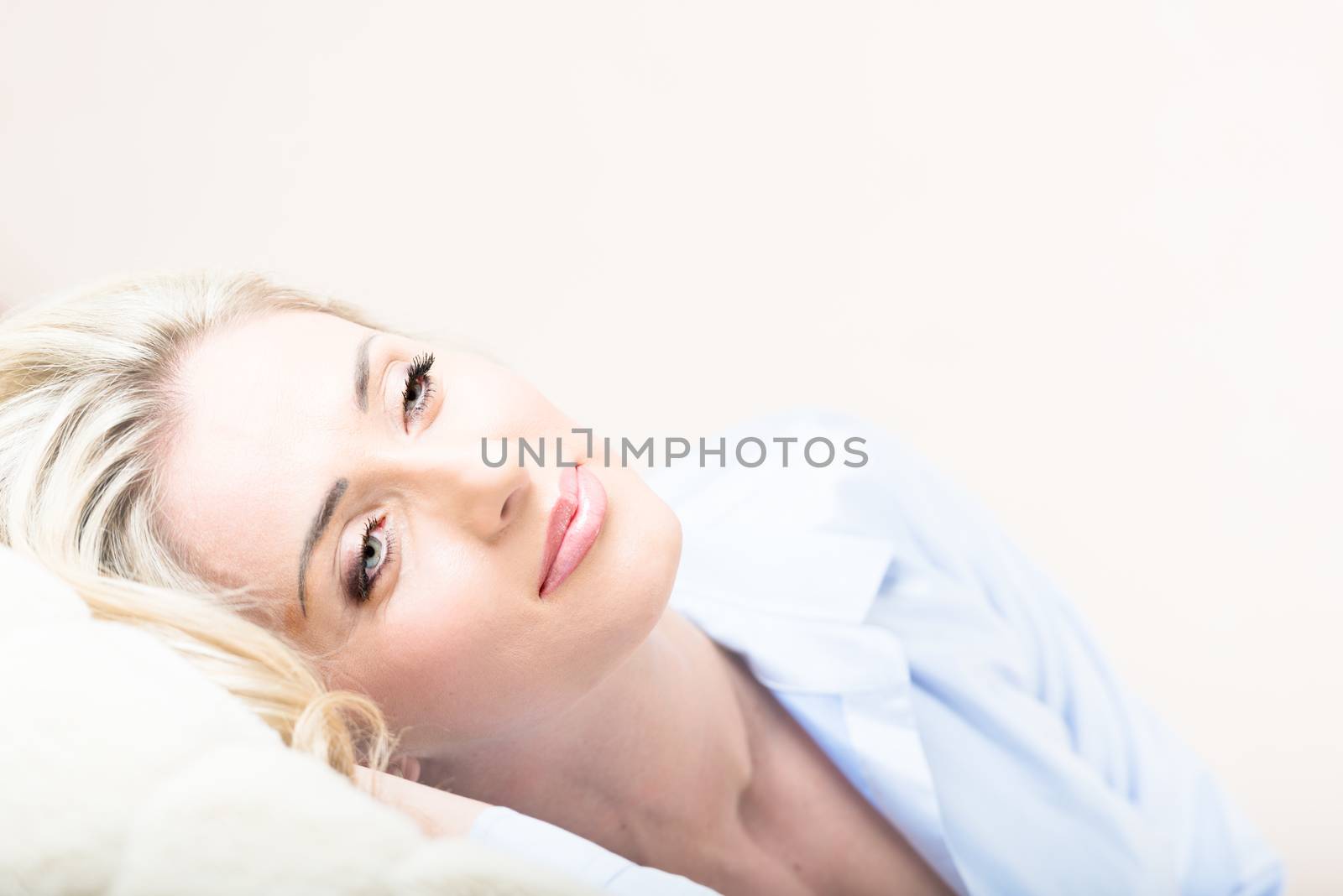 Portrait of sexy hot smiling blond by Nanisimova
