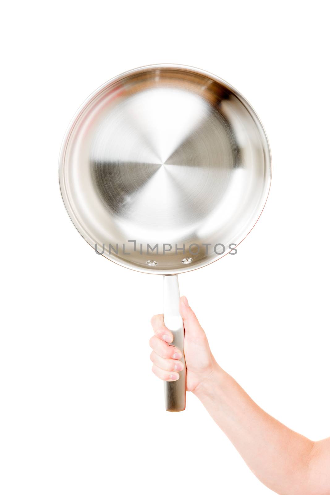 Steel frying pan hold by hand isolated on white background