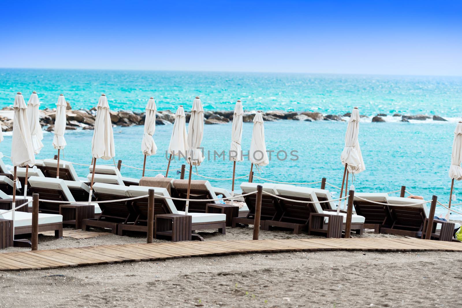 Sunbathing benches at beach