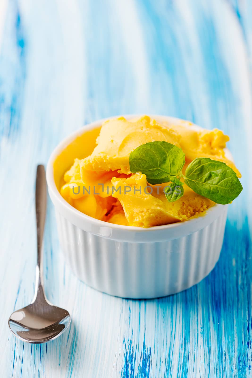 Passion fruit sherbet with mint leaves