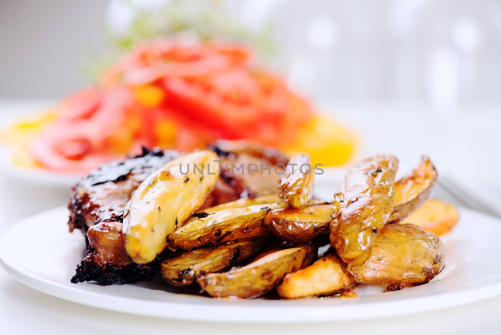 Oven baked potato on plate