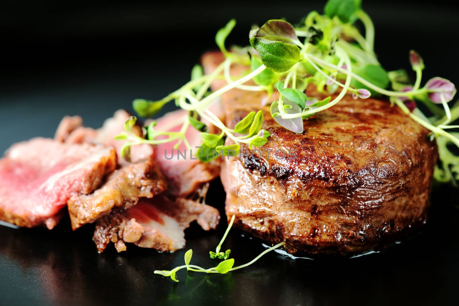 Delicious beef steak on a plate, close-up